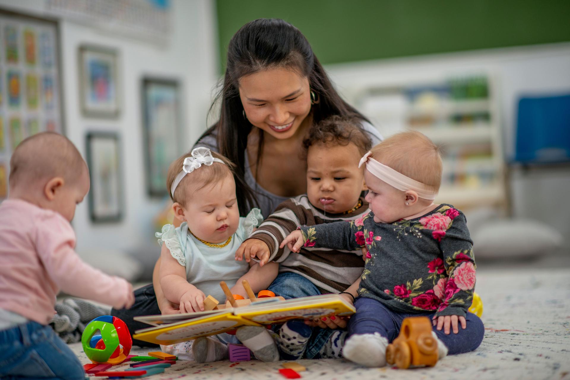 Daycare Worker Supervising Children